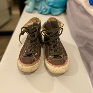 Brown high top converse. Worn a few times.